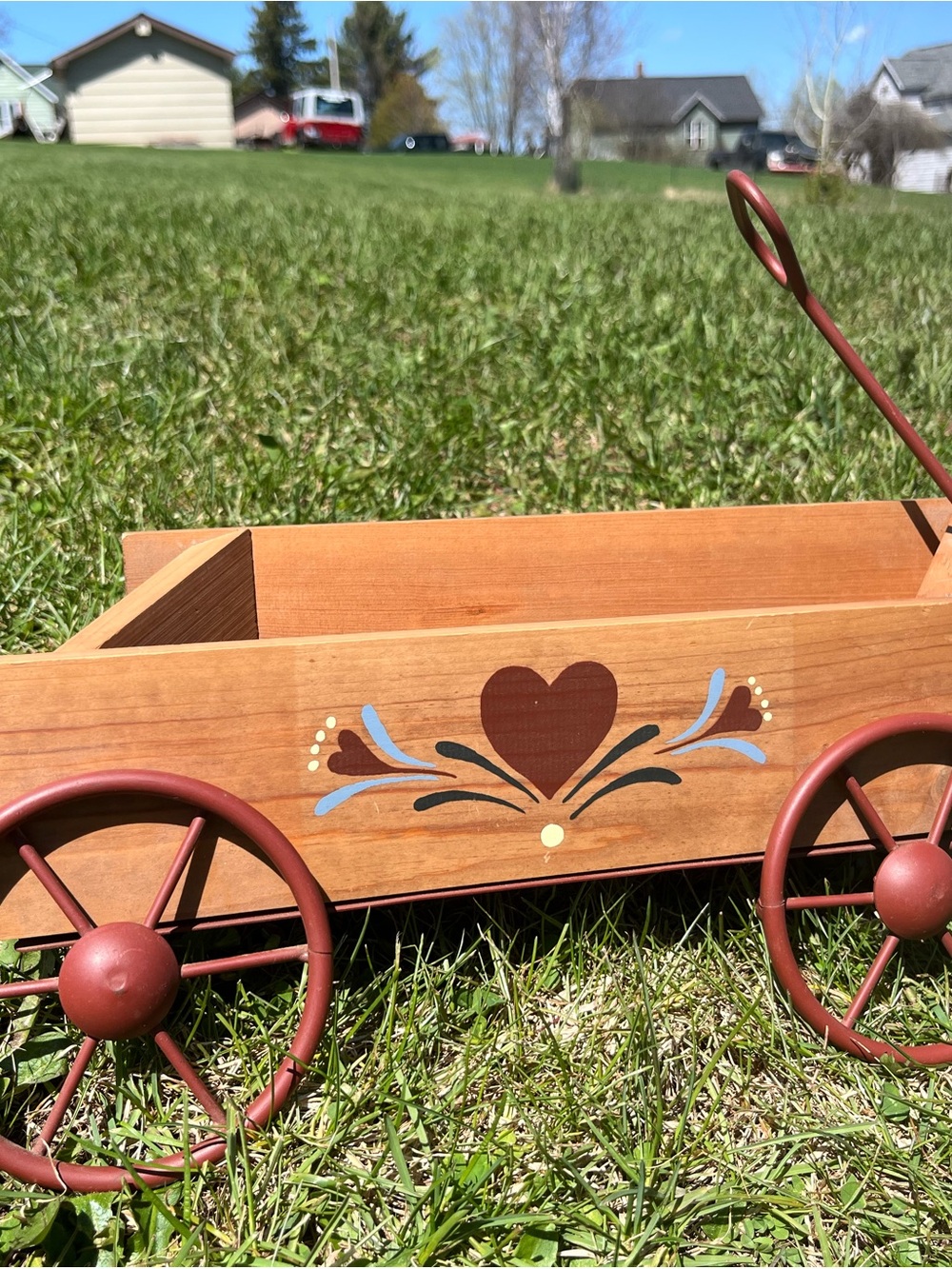 Wooden Heart Wagon Wall Pocket.Natural Wood with Red Wheels
